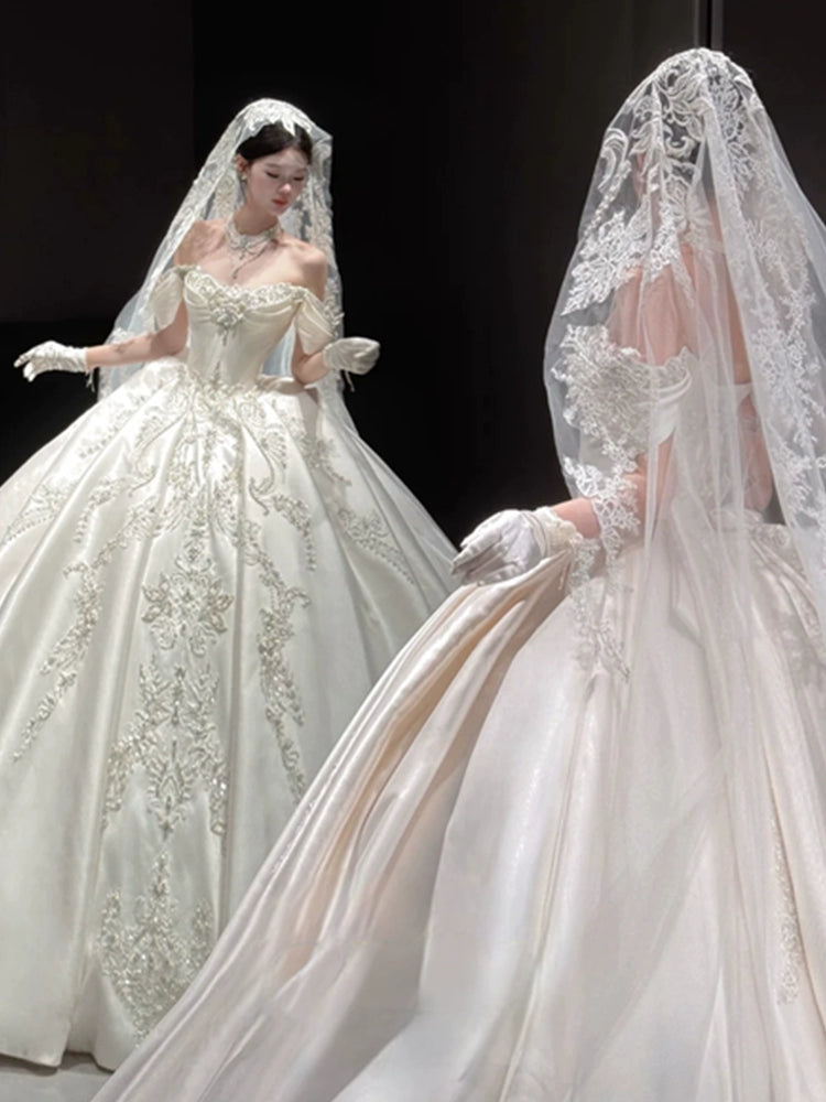 White shoulder satin wedding dress 2025 new bridal light luxury niche large trailing vintage retro main veil